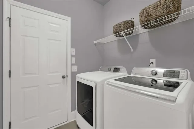 a bed room with a bed and a ceiling fan