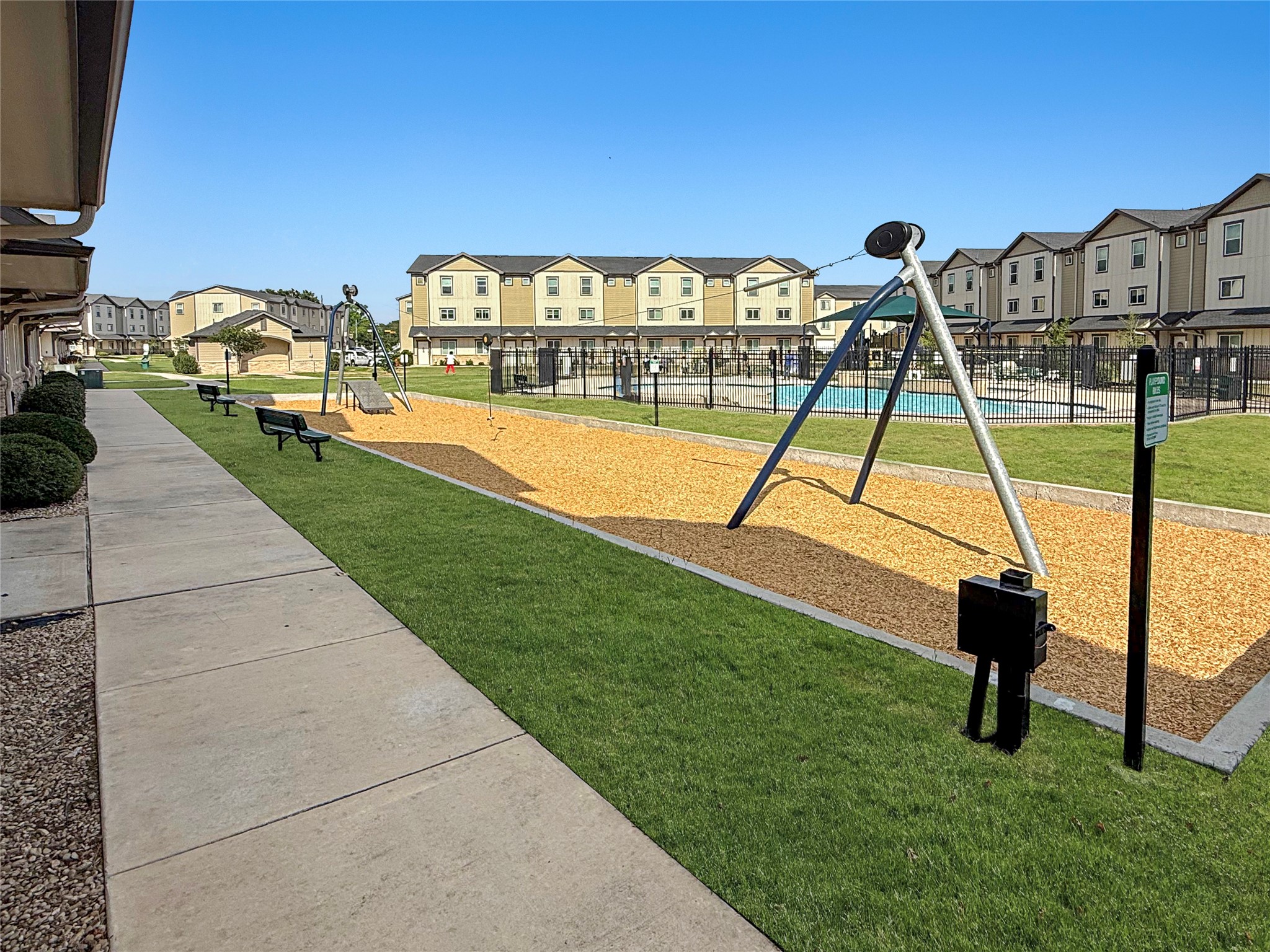 12603 Telge Road, Unit 8EH Cypress, TX 77429 - Photo 5 of 32 a view of yard with swimming pool