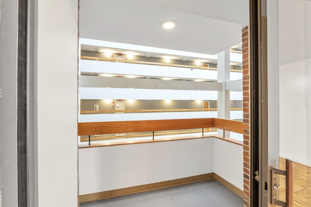 357 Commercial Street, Unit 219 Boston, MA 02109 - Photo 8 of 16 a view of walk in closet with empty racks