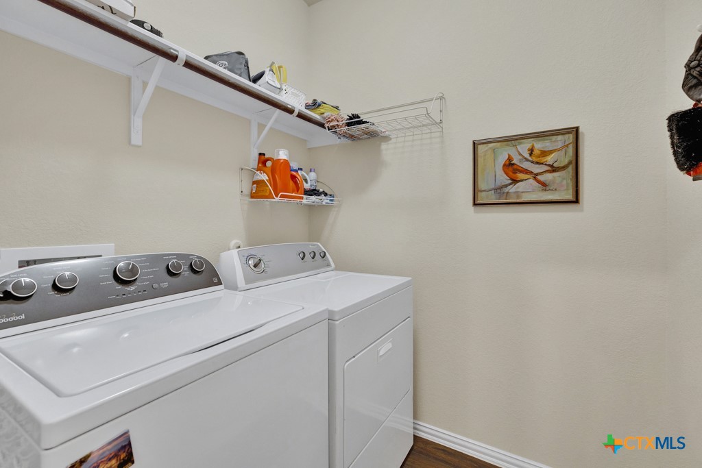 1444 Harwell Loop Kyle, TX 78640 - Photo 21 of 37 a utility room with dryer and washer