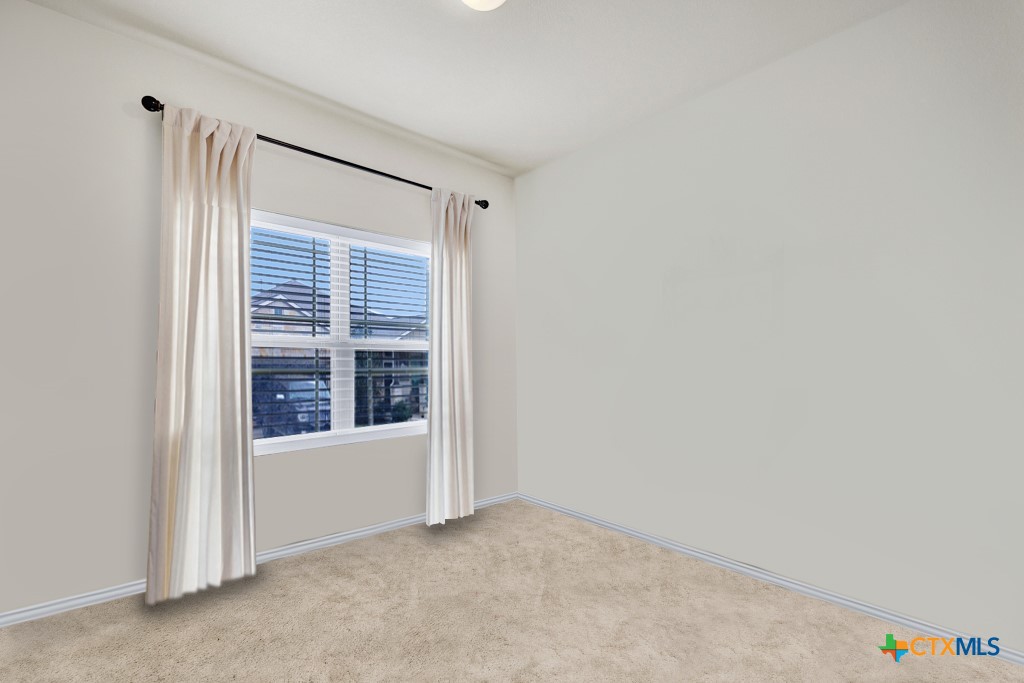1444 Harwell Loop Kyle, TX 78640 - Photo 4 of 37 a view of an empty room with a window