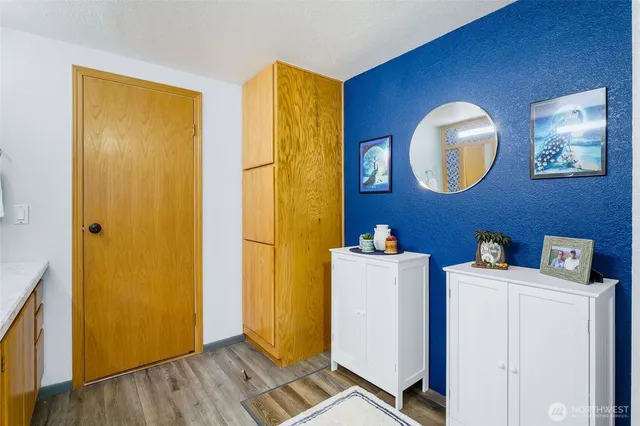 a view of cabinets with wooden floor