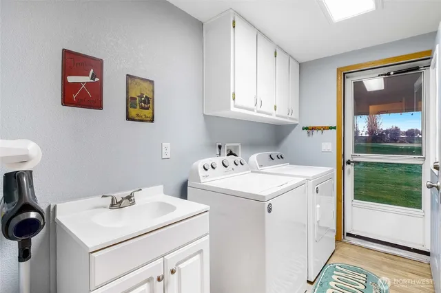 a utility room with dryer and washer