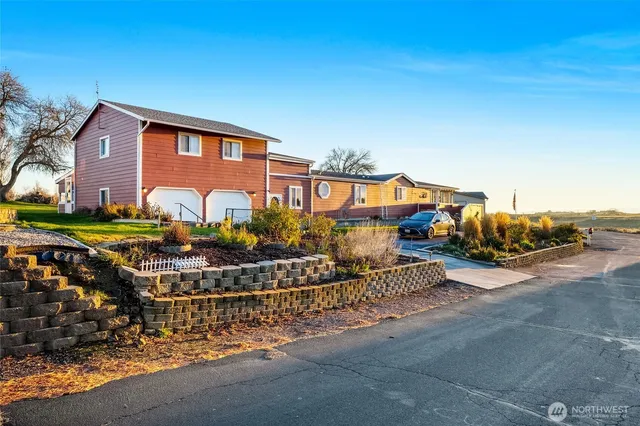 a view of a house with a park