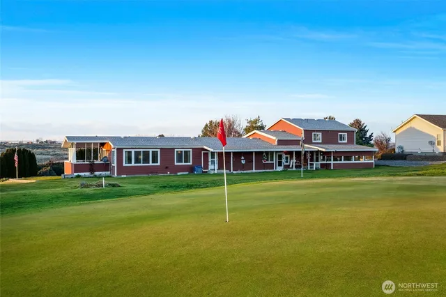 a view of a house with a big yard