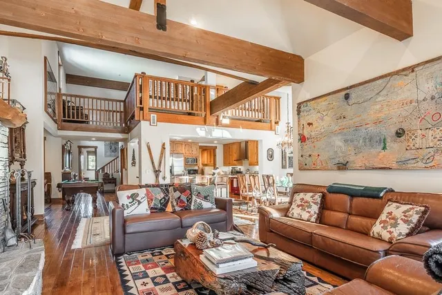 a view of a living room filled with furniture