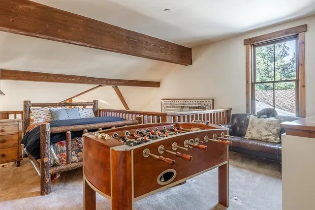 a view of a couches and a couch in a room