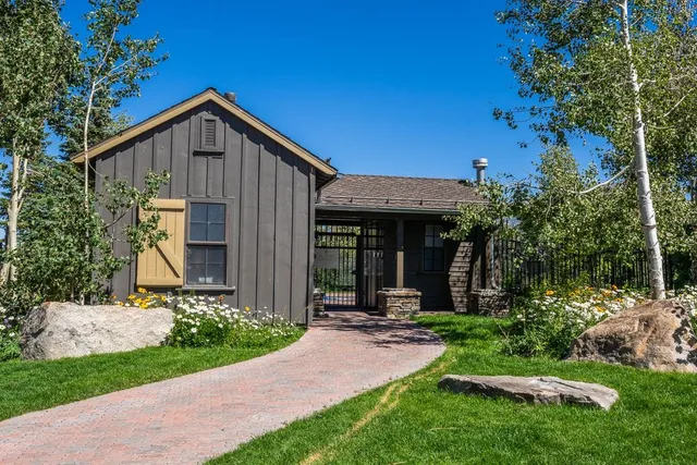 a view of a pool with a yard