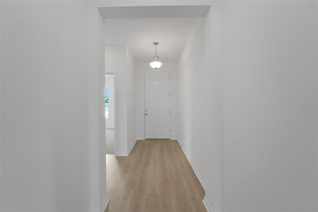 2857 Doolittle Street Tavares, FL 32778 - Photo 14 of 31 a view of a hallway