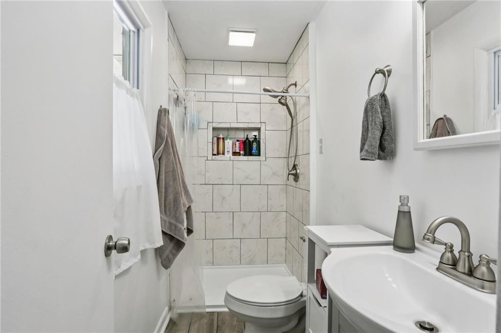 2740 Frontier Trail Atlanta, GA 30341 - Photo 25 of 29 a bathroom with a sink toilet and shower