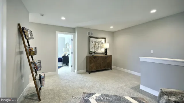 a view of a hallway with workspace