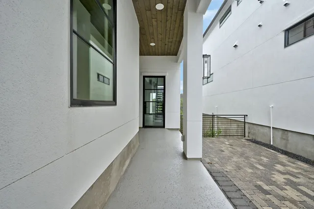 a view of a hallway with entryway