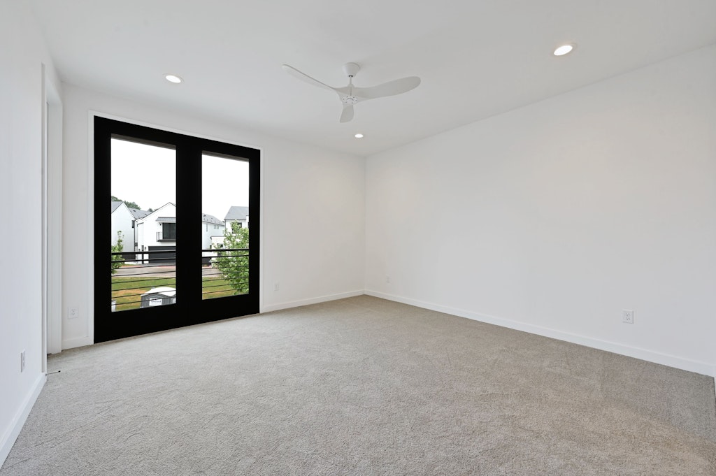 6805 Adeline Way, Unit 17 Austin, TX 78746 - Photo 31 of 38 Spare room with light colored carpet, recessed lighting, and ceiling fan