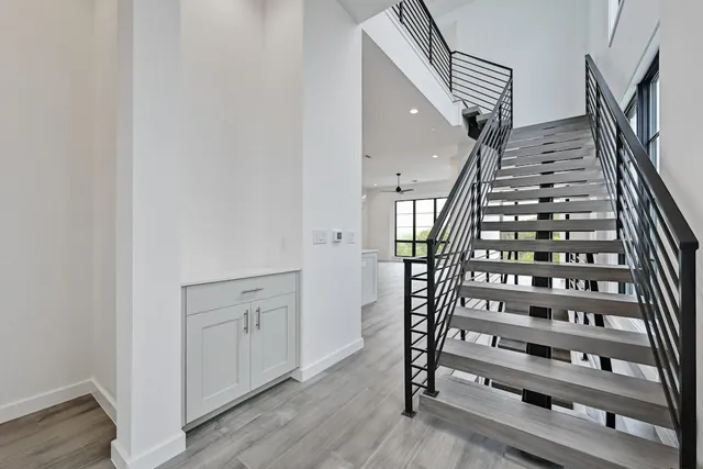 a view of entryway with wooden floor