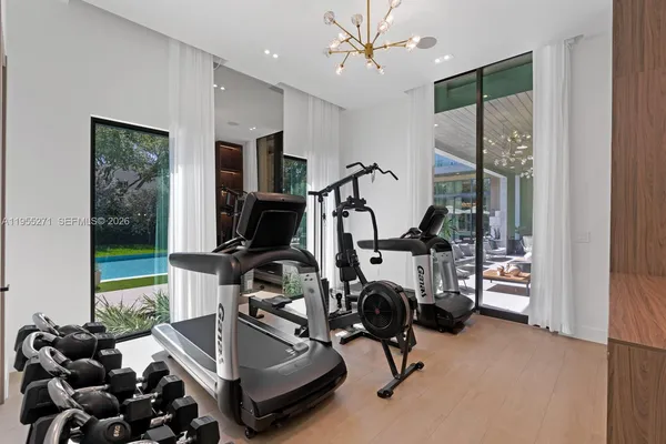 a room with furniture and a flat screen tv