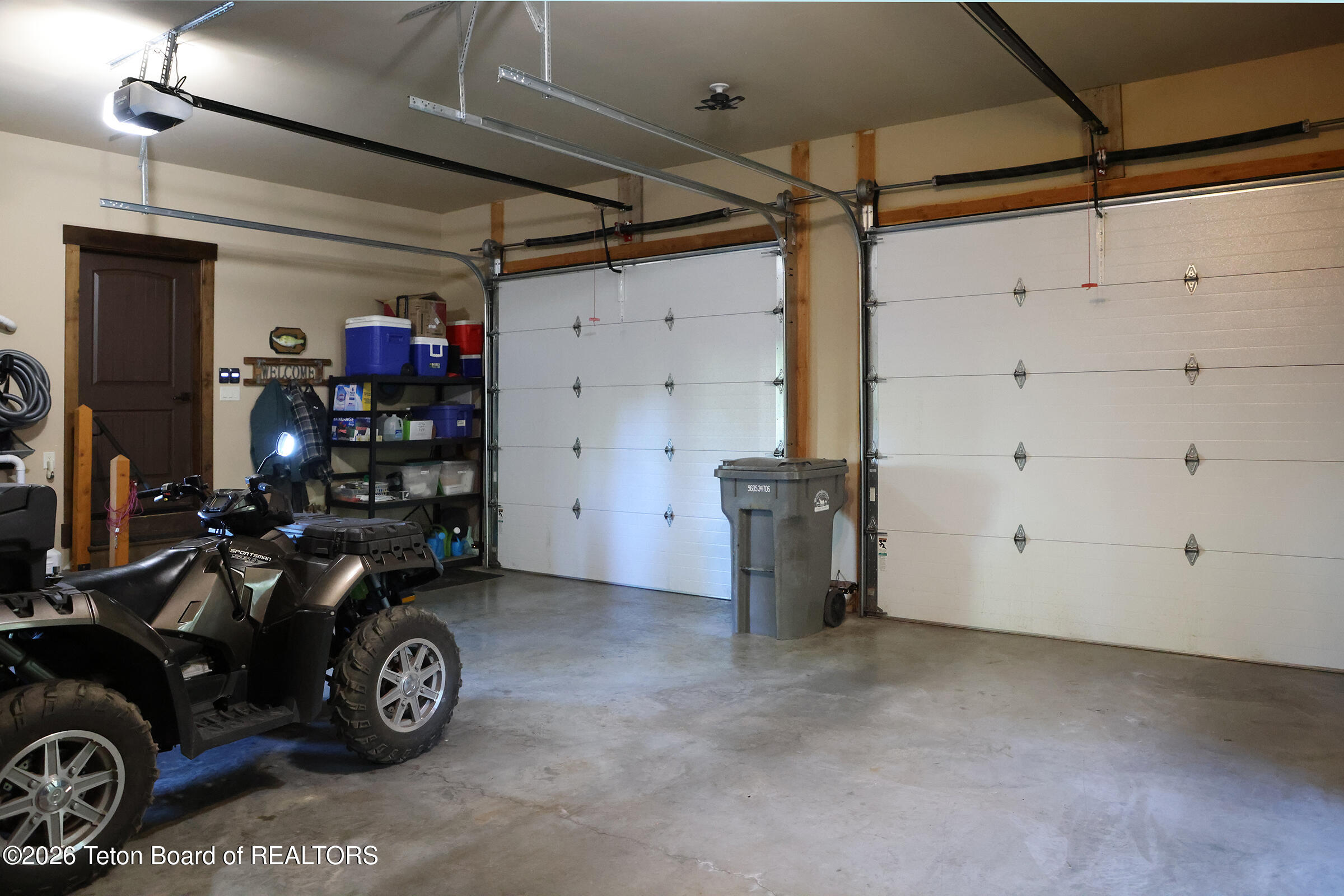 166 Aspen Ridge Trail Alpine, WY 83128 - Photo 37 of 50 36_166_Aspen_Ridge_Trail_Garage_Doors