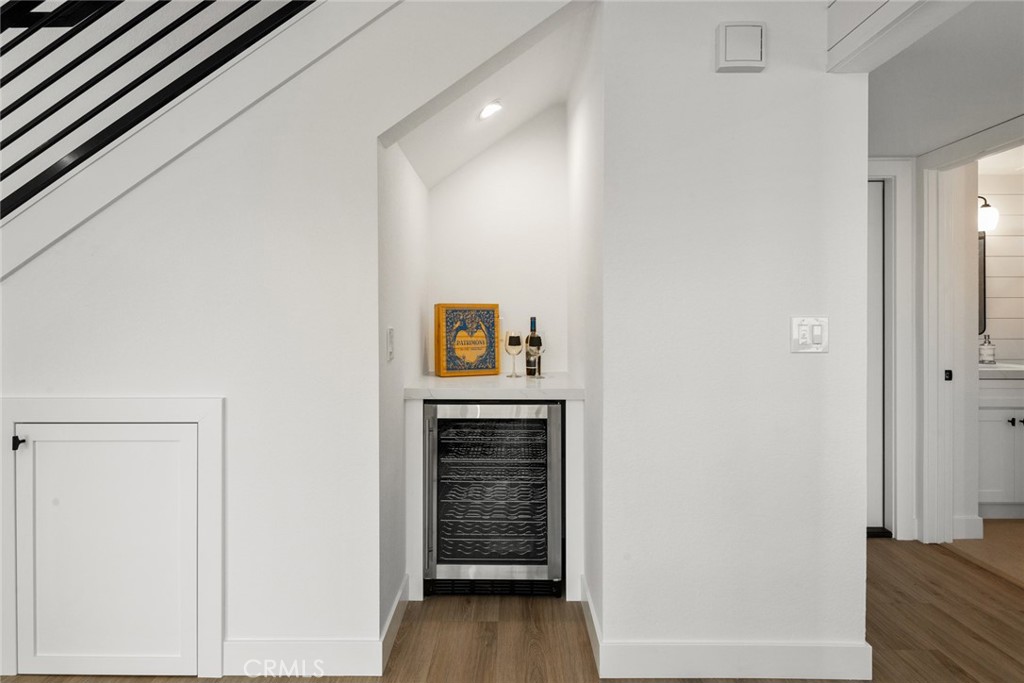 2221 Apple Tree Drive Tustin, CA 92780 - Photo 16 of 30 a view of a hallway to an empty room and fire place