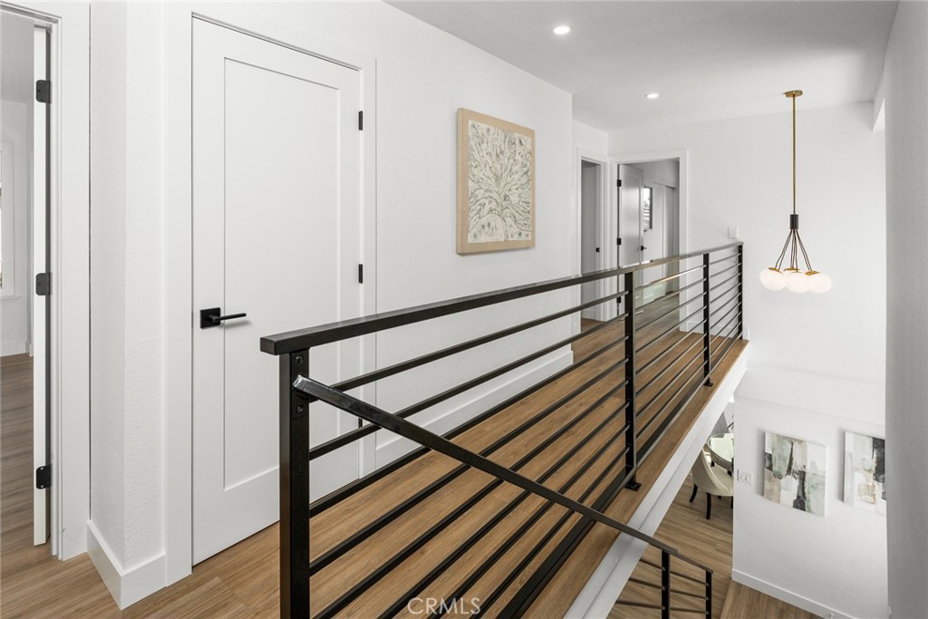 2221 Apple Tree Drive Tustin, CA 92780 - Photo 17 of 30 a view of entryway and hall with wooden floor