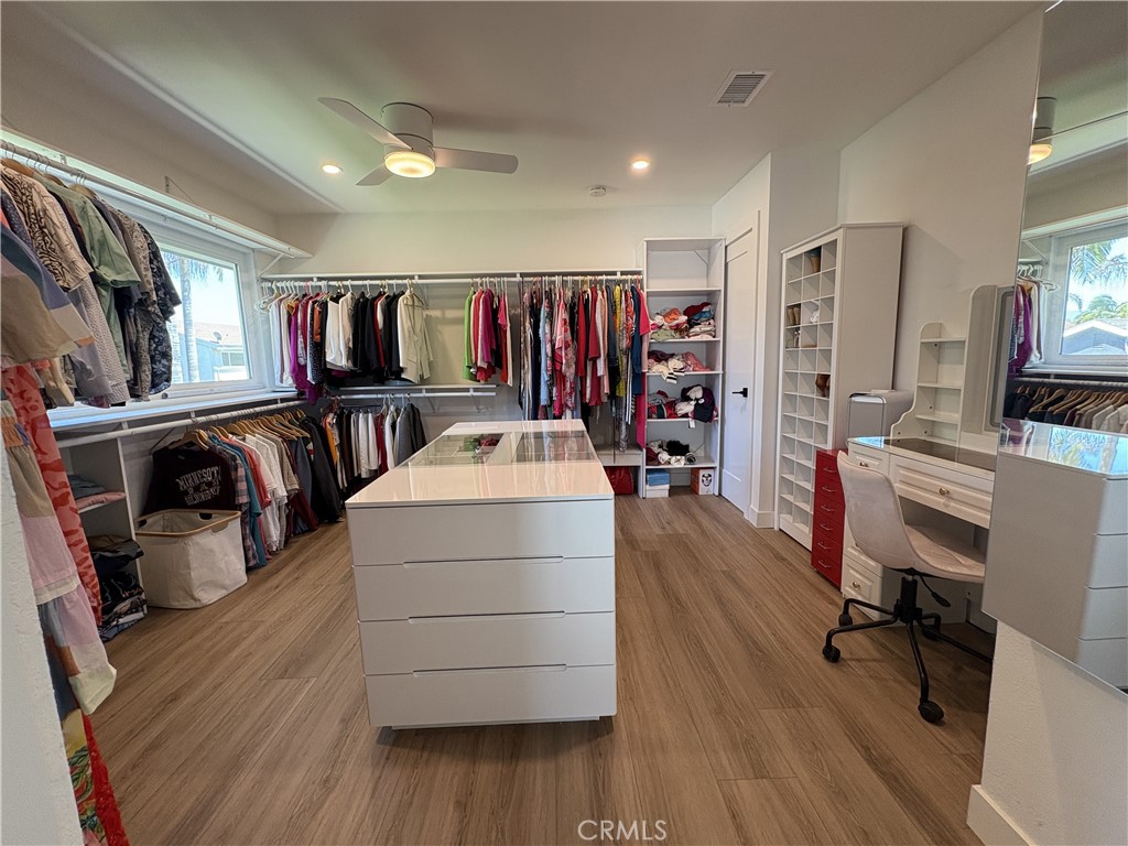 2221 Apple Tree Drive Tustin, CA 92780 - Photo 20 of 30 a view of a workspace with furniture and wooden floor