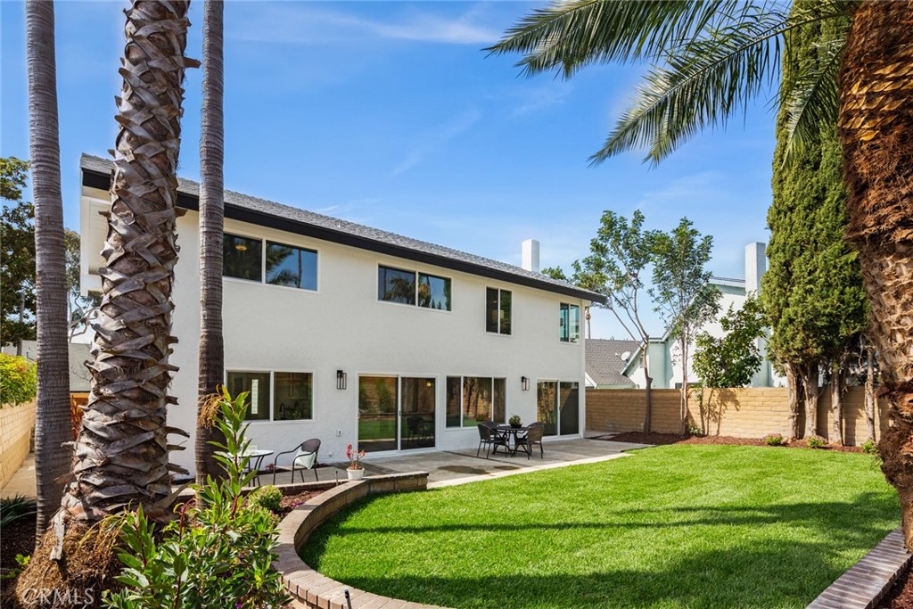 2221 Apple Tree Drive Tustin, CA 92780 - Photo 30 of 30 a view of a house with backyard and sitting area