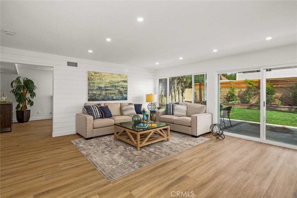2221 Apple Tree Drive Tustin, CA 92780 - Photo 8 of 30 a living room with furniture and a large window