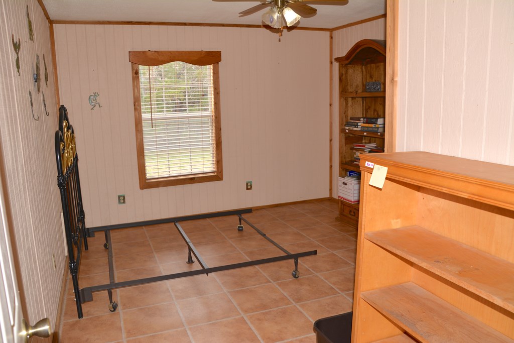 341 Seth Circle Bandera, TX 78003 - Photo 21 of 28 a view of an empty room with a window