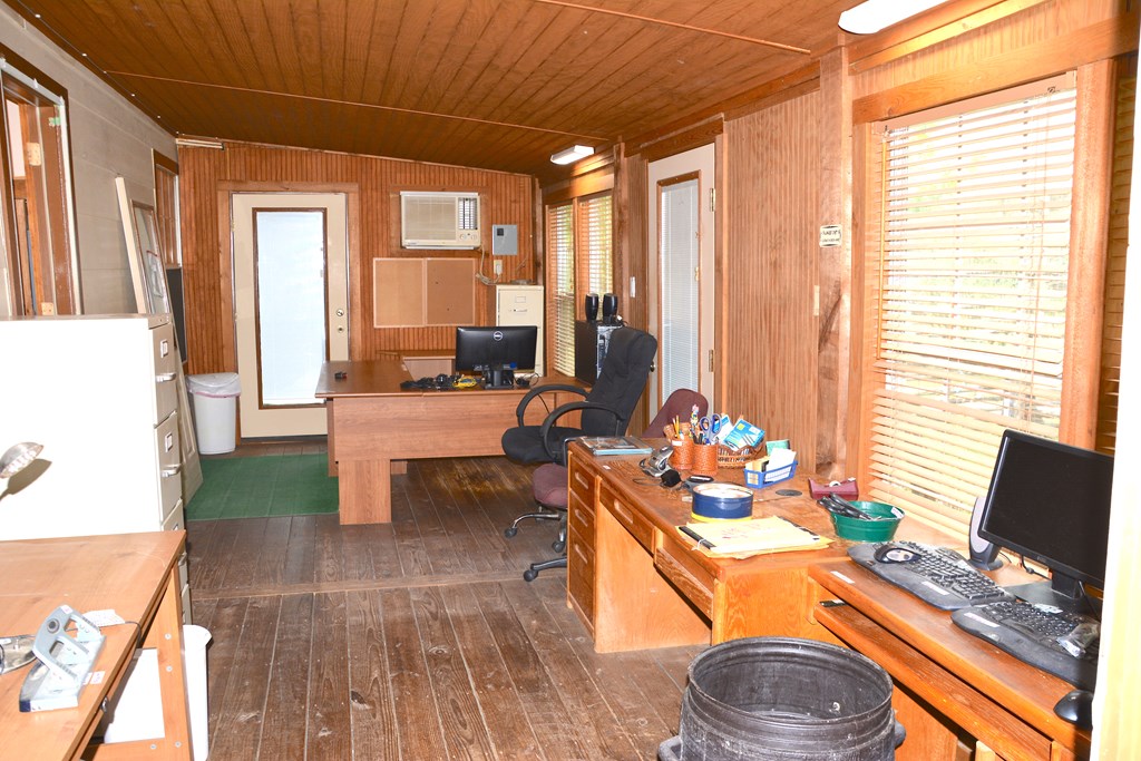 341 Seth Circle Bandera, TX 78003 - Photo 23 of 28 a dining room with furniture and a window