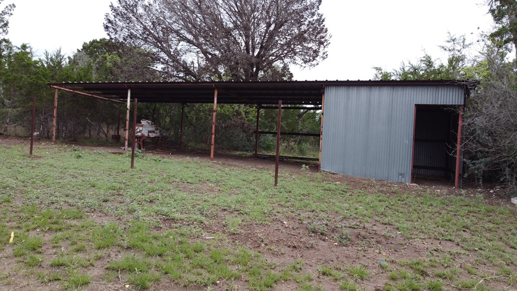 341 Seth Circle Bandera, TX 78003 - Photo 25 of 28 a backyard of a house with entertaining space