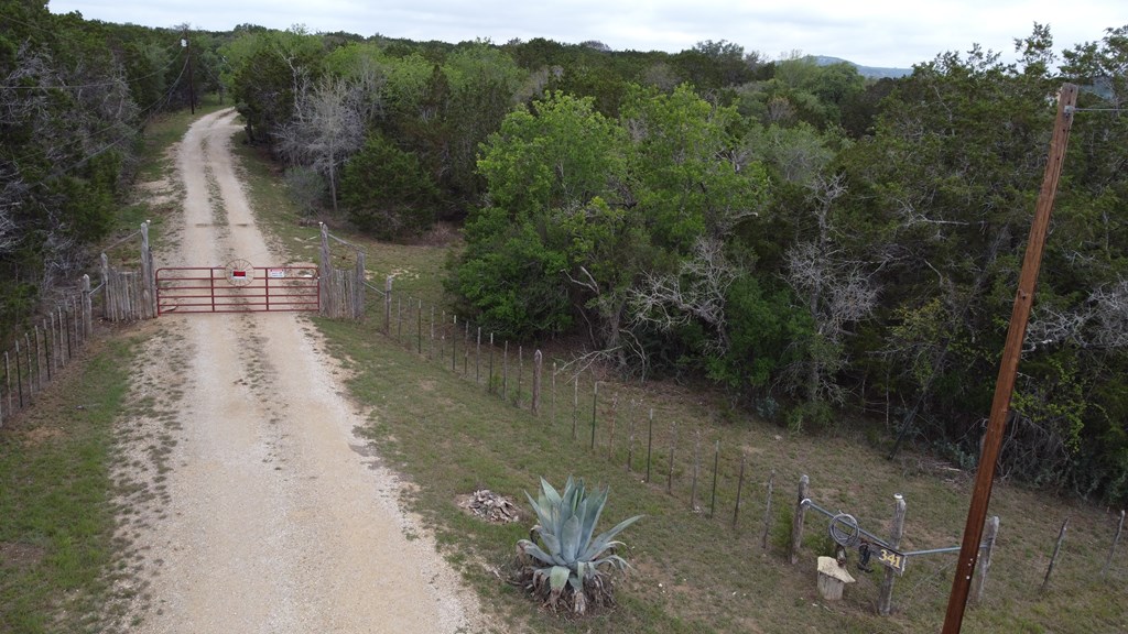 341 Seth Circle Bandera, TX 78003 - Photo 27 of 28 a view of a lake with mountain view