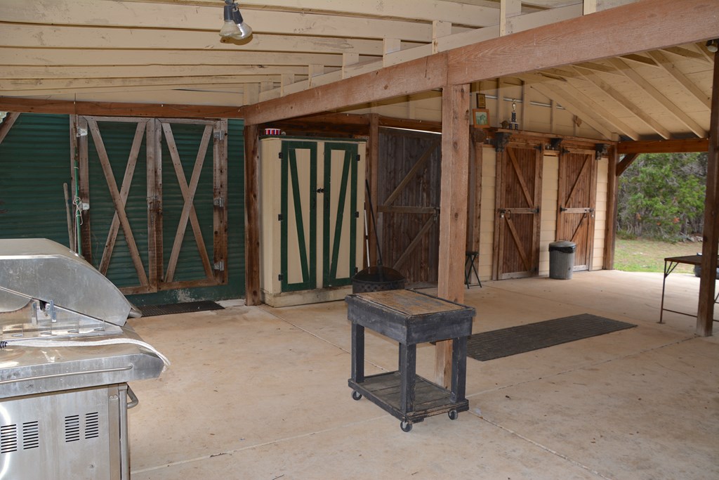 341 Seth Circle Bandera, TX 78003 - Photo 7 of 28 a view of backyard with cabin
