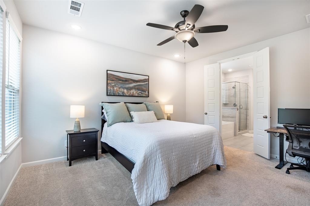2012 Pacific Avenue Anna, TX 75409 - Photo 17 of 34 a bedroom with a bed gym equipment and a window