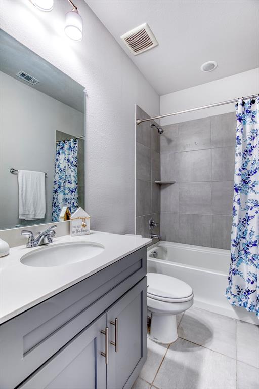 2012 Pacific Avenue Anna, TX 75409 - Photo 22 of 34 a bathroom with a sink a toilet and shower