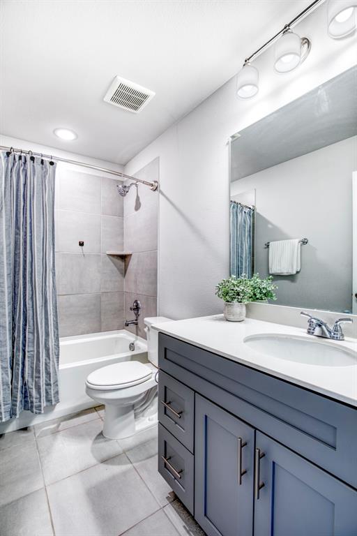 2012 Pacific Avenue Anna, TX 75409 - Photo 26 of 34 a bathroom with a sink a toilet and shower