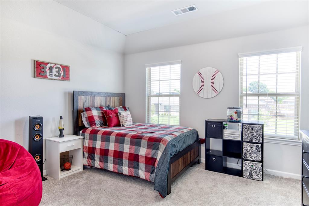 2012 Pacific Avenue Anna, TX 75409 - Photo 27 of 34 a bedroom with a bed and a window
