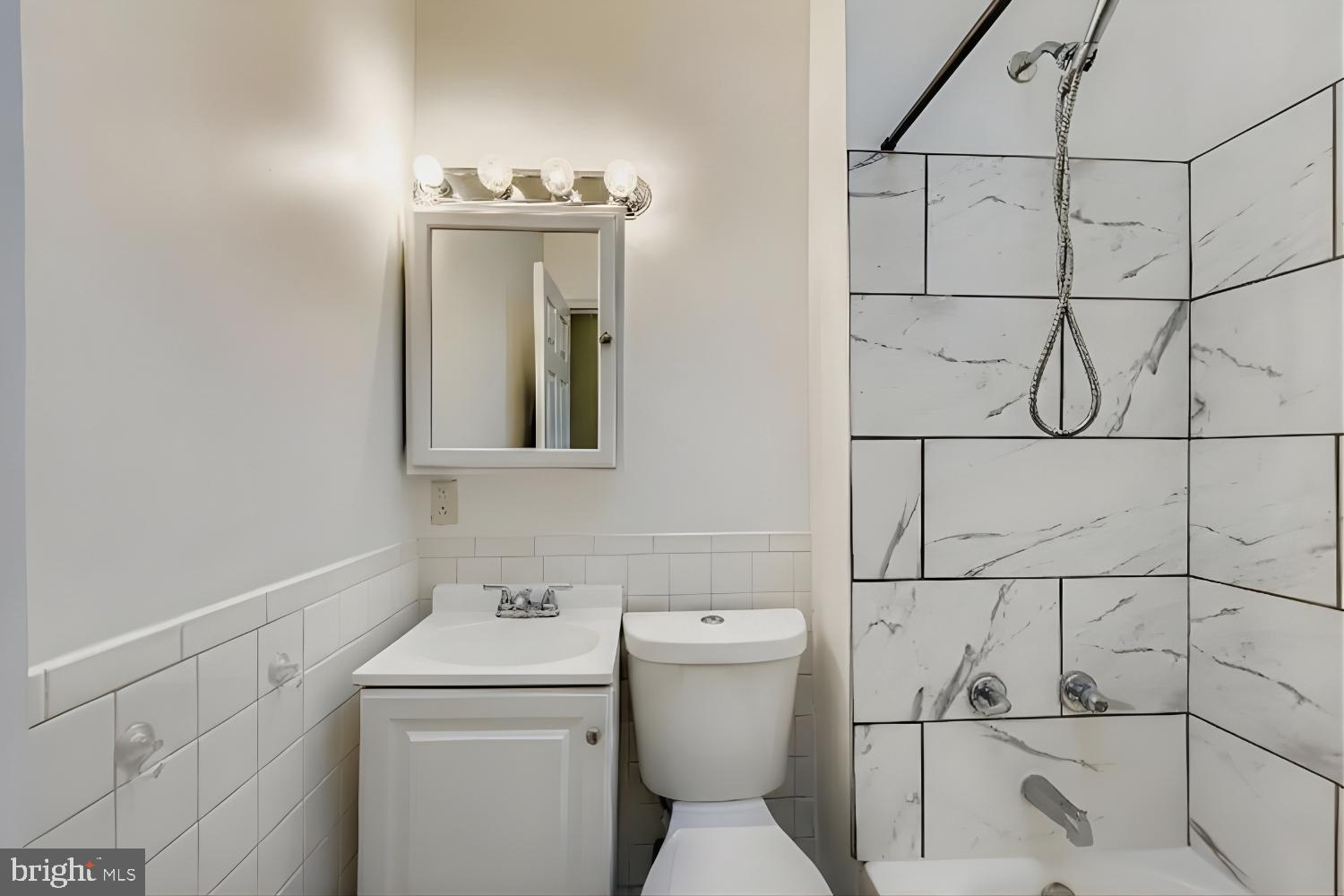 904 North Franklintown Road Baltimore, MD 21216 - Photo 12 of 26 Updated Hall Bathroom