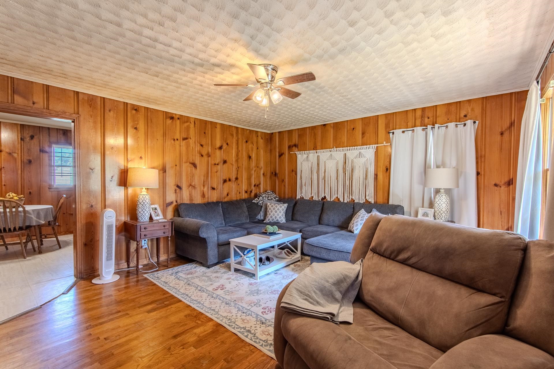 615 Patterson Road Savannah, TN 38372 - Photo 12 of 38 a living room with furniture and a large window