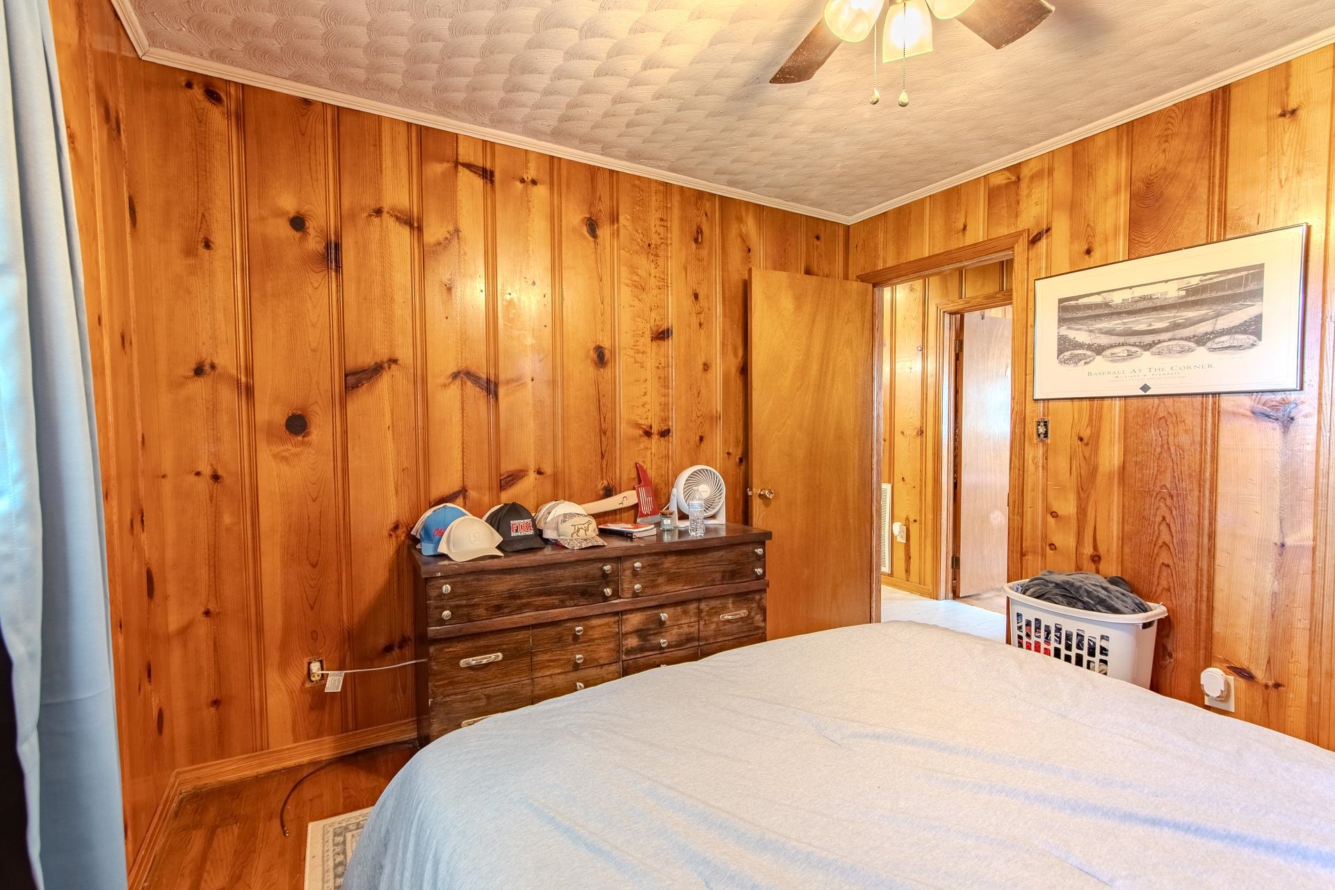 615 Patterson Road Savannah, TN 38372 - Photo 22 of 38 a bedroom with a bed and a dresser