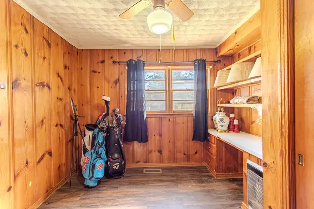 a view of a door and wooden floor