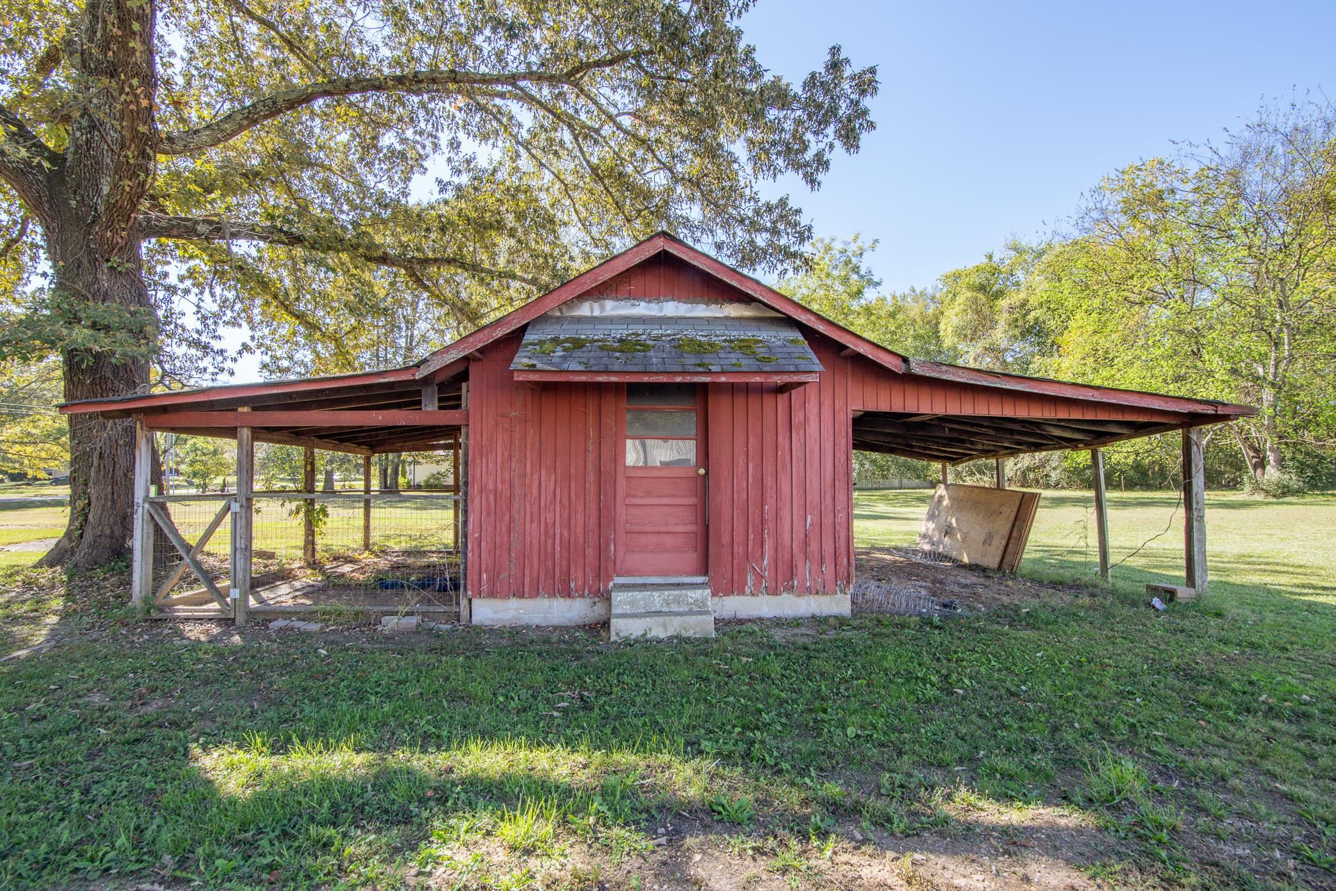 615 Patterson Road Savannah, TN 38372 - Photo 5 of 38 a view of a house with backyard and a tree