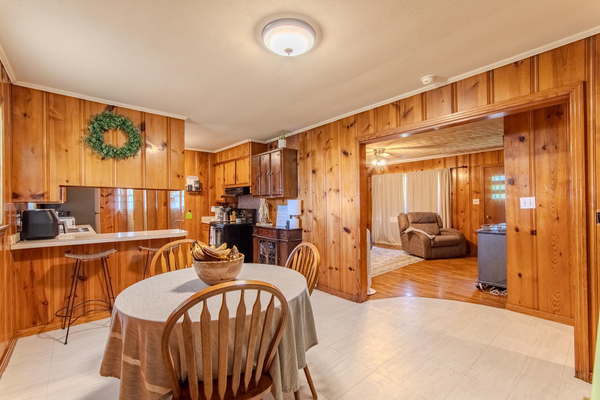 615 Patterson Road Savannah, TN 38372 - Photo 7 of 38 a living room with furniture a rug and a large window