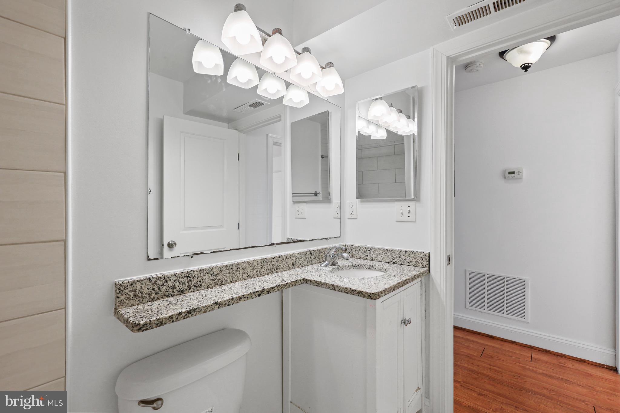 1316 Spring Road Northwest, Unit 102 Washington, DC 20010 - Photo 9 of 11 a view of a bathroom sink