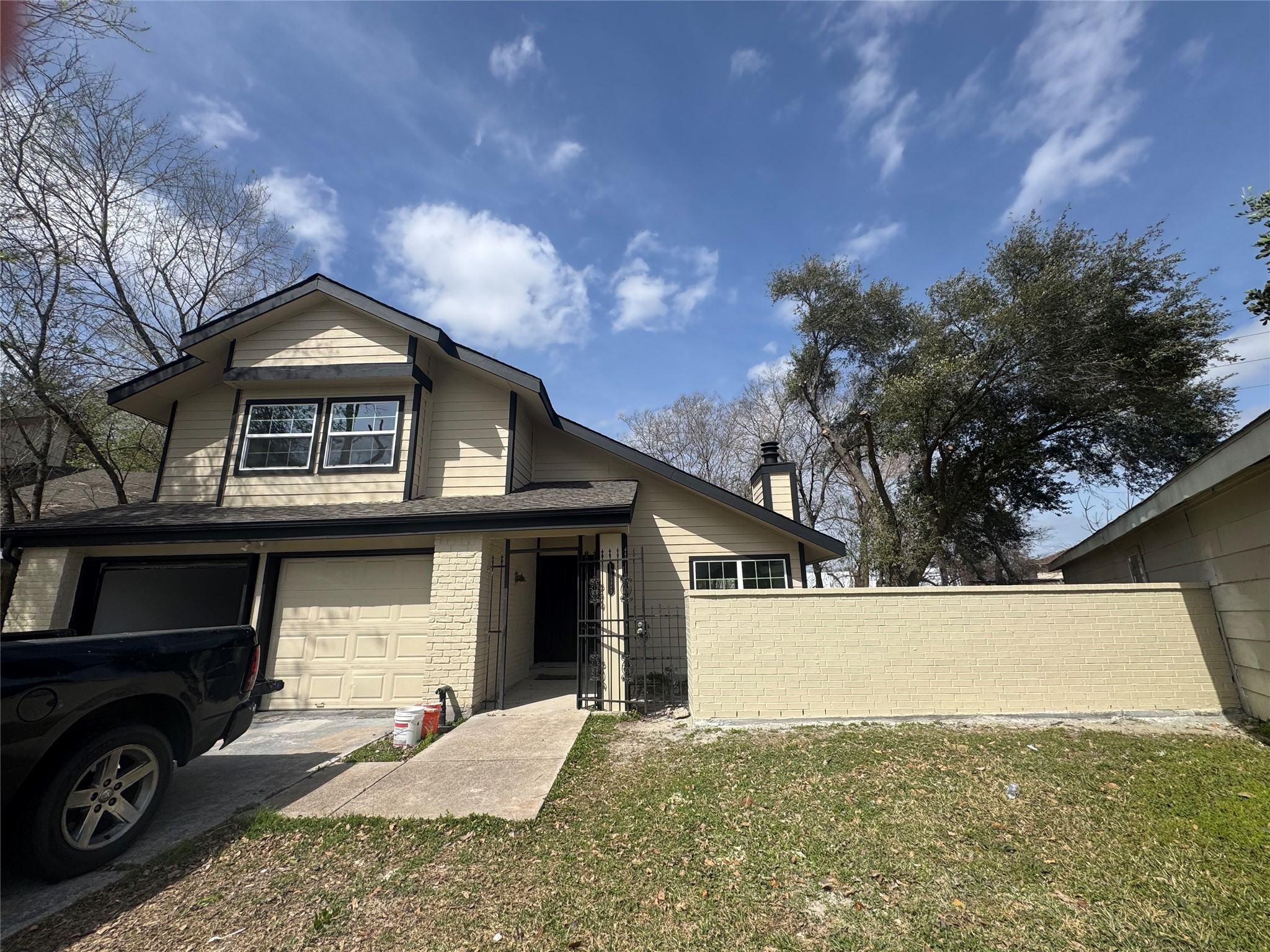 13626 Sunswept Way Houston, TX 77082 - Photo 4 of 30 New windows and brick wall