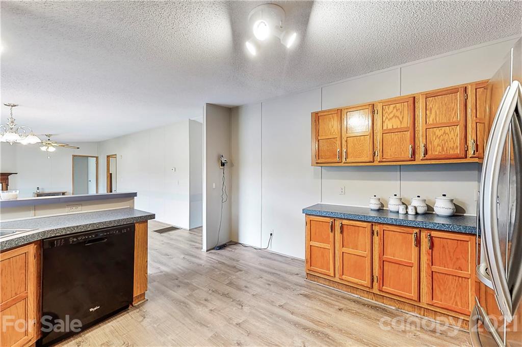 2688 Howells Ferry Road Hickory Grove, SC 29717 - Photo 12 of 43 a kitchen with stainless steel appliances granite countertop a stove and a sink