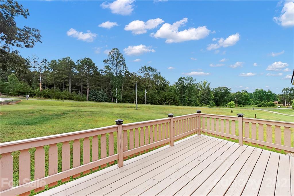 2688 Howells Ferry Road Hickory Grove, SC 29717 - Photo 30 of 43 a view of a balcony with wooden floor and fence