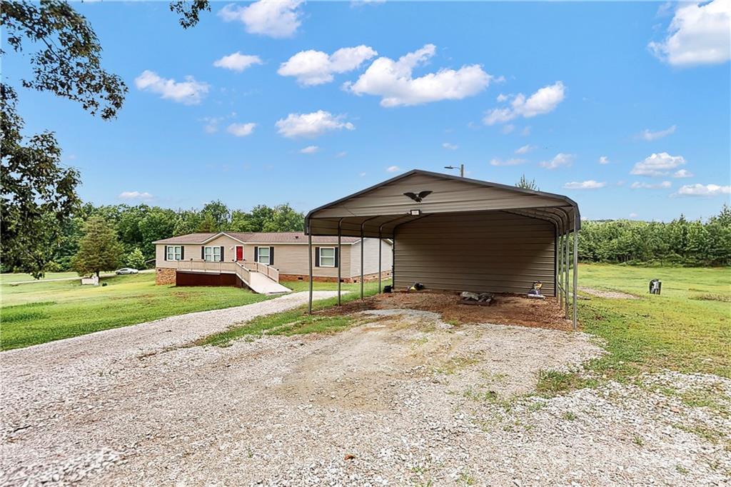 2688 Howells Ferry Road Hickory Grove, SC 29717 - Photo 33 of 43 a view of a house with a yard