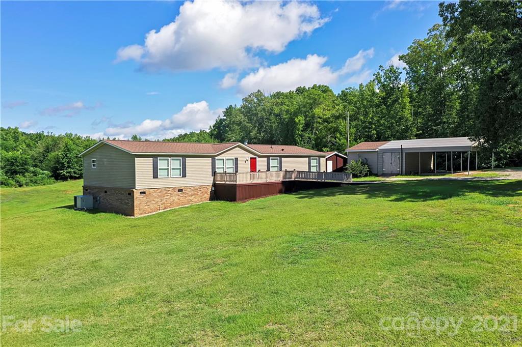 2688 Howells Ferry Road Hickory Grove, SC 29717 - Photo 39 of 43 a view of a house with a backyard