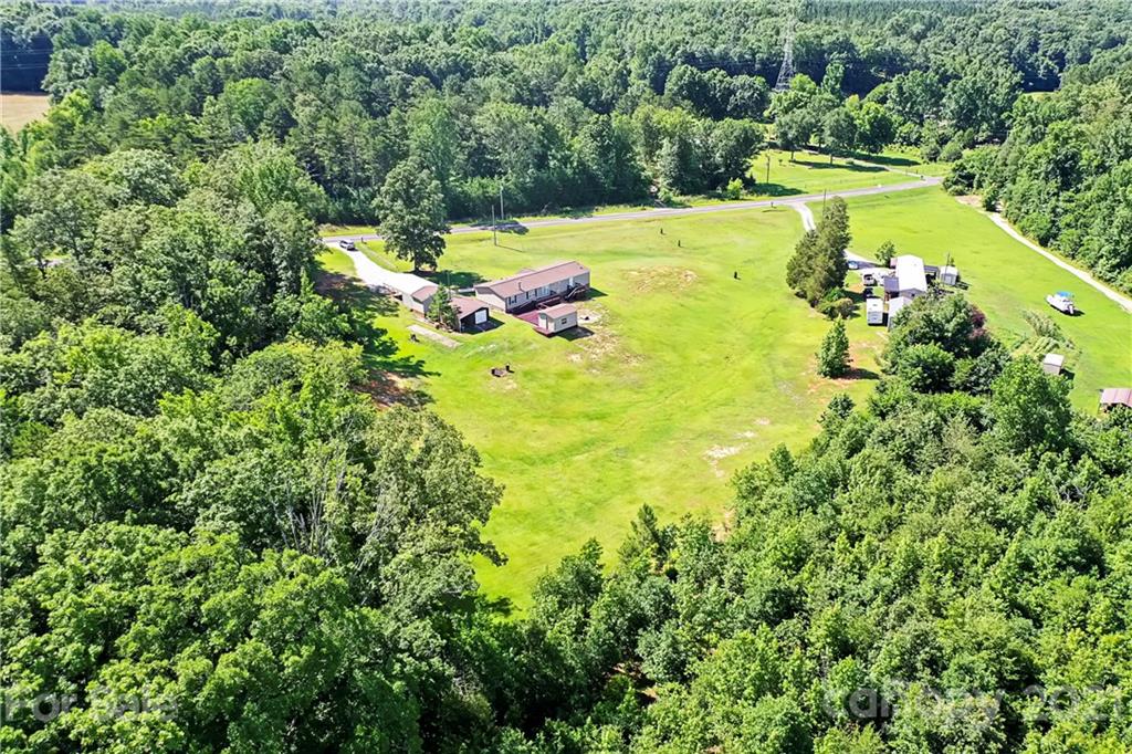 2688 Howells Ferry Road Hickory Grove, SC 29717 - Photo 40 of 43 a view of a swimming pool with a yard