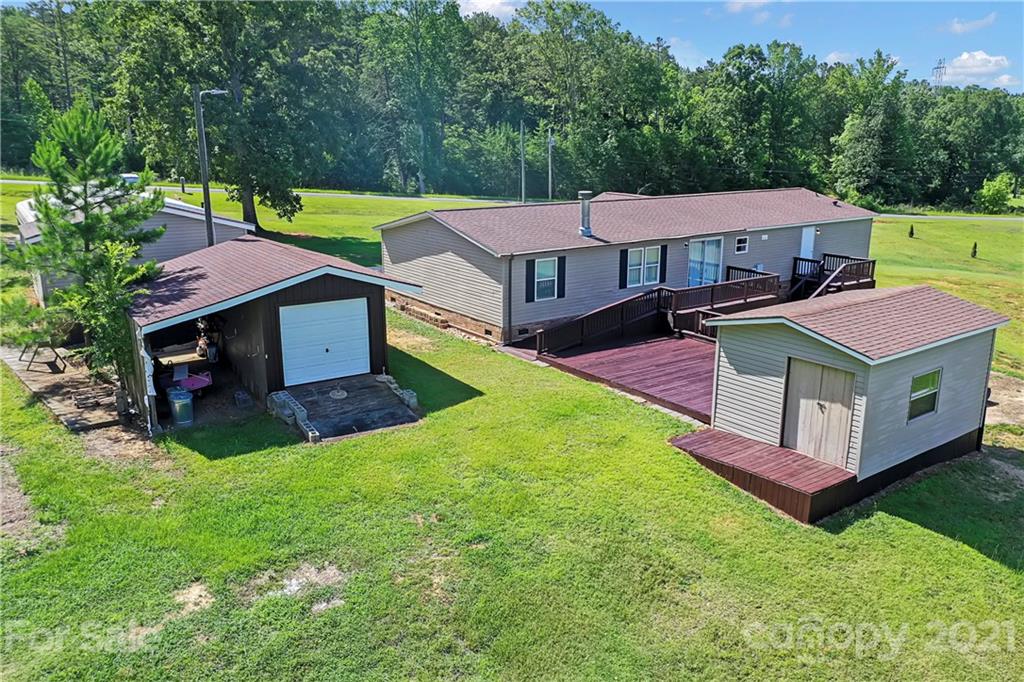 2688 Howells Ferry Road Hickory Grove, SC 29717 - Photo 42 of 43 a aerial view of a house with a yard table and chairs