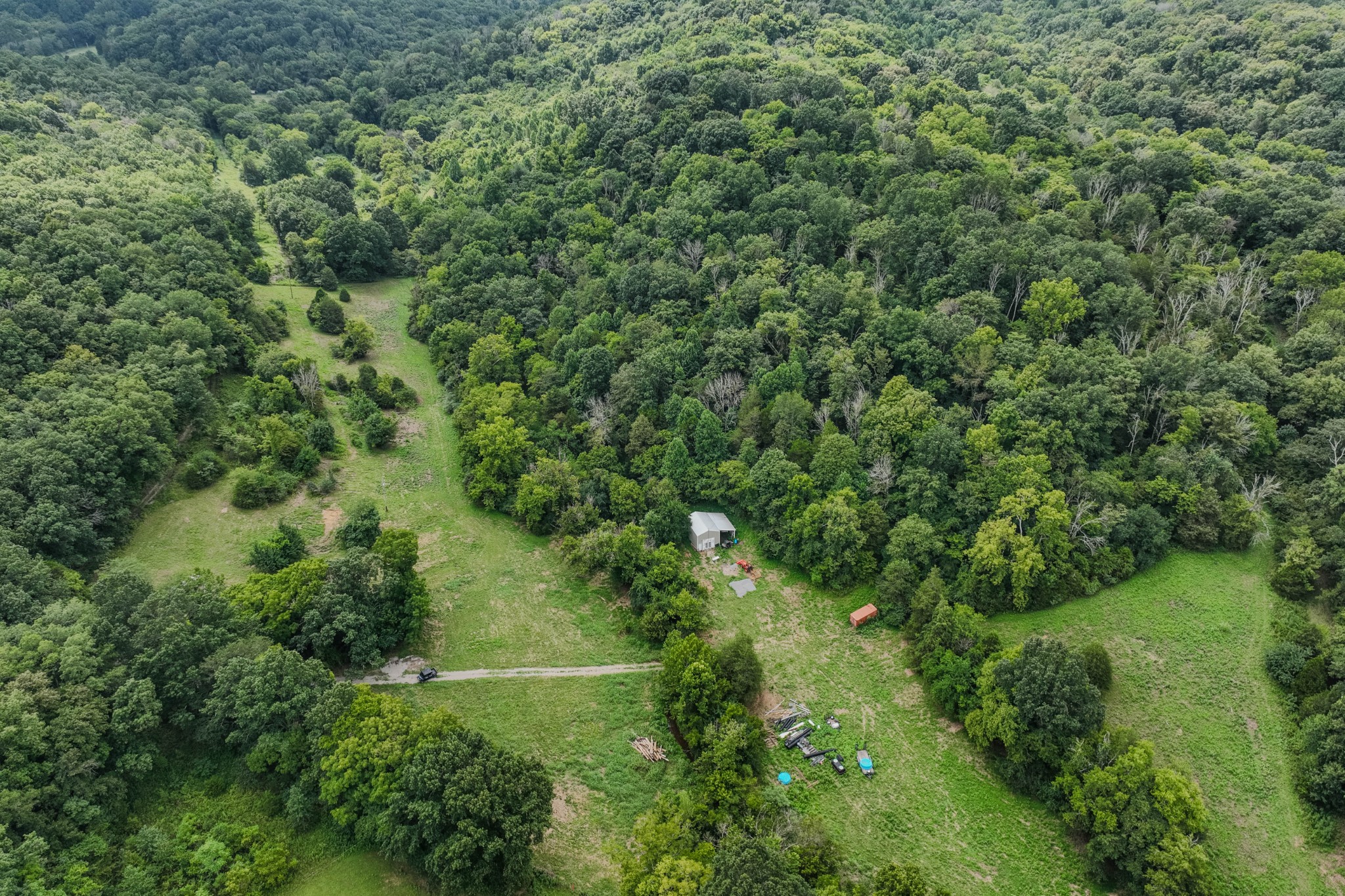3264 Martin Hollow Road Culleoka, TN 38451 - Photo 14 of 68 an aerial view of residential house with outdoor space and trees all around