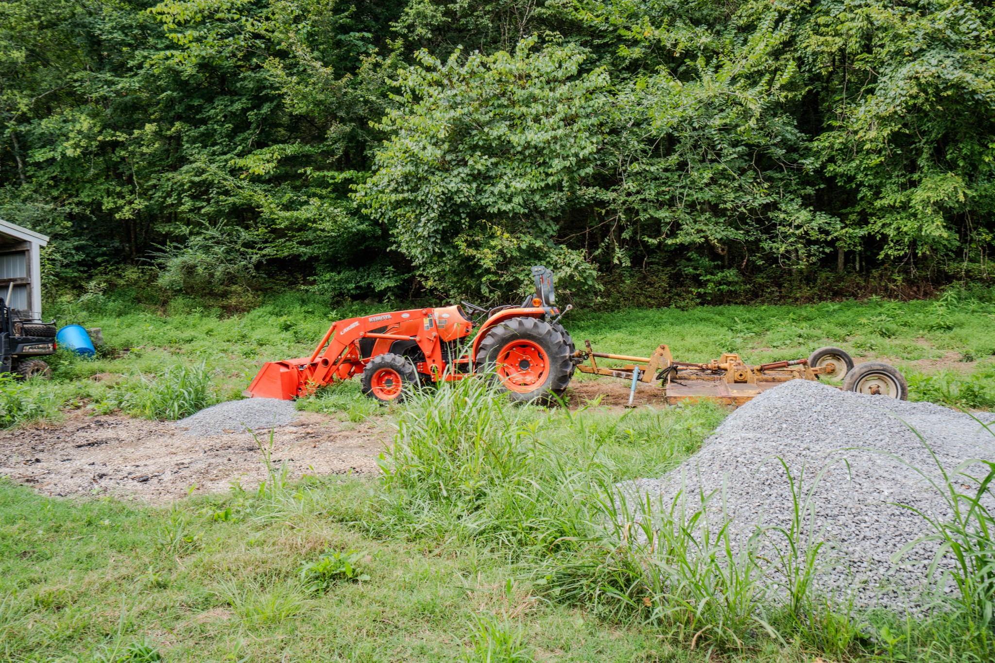 3264 Martin Hollow Road Culleoka, TN 38451 - Photo 36 of 68 a backyard of a house with yard and trampoline